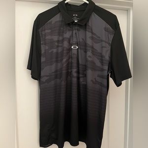 Very nice Oakley camo polo. New without tags
